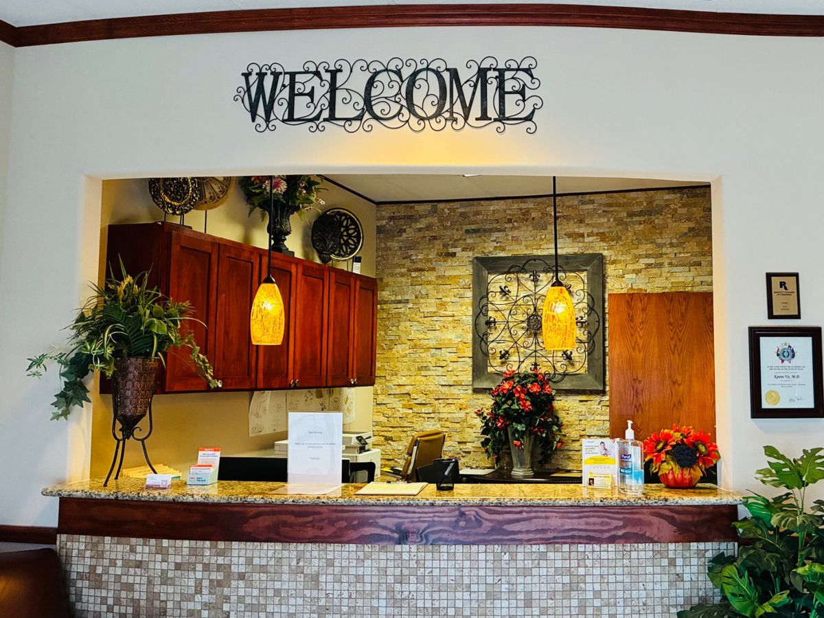 Front desk with welcome sign